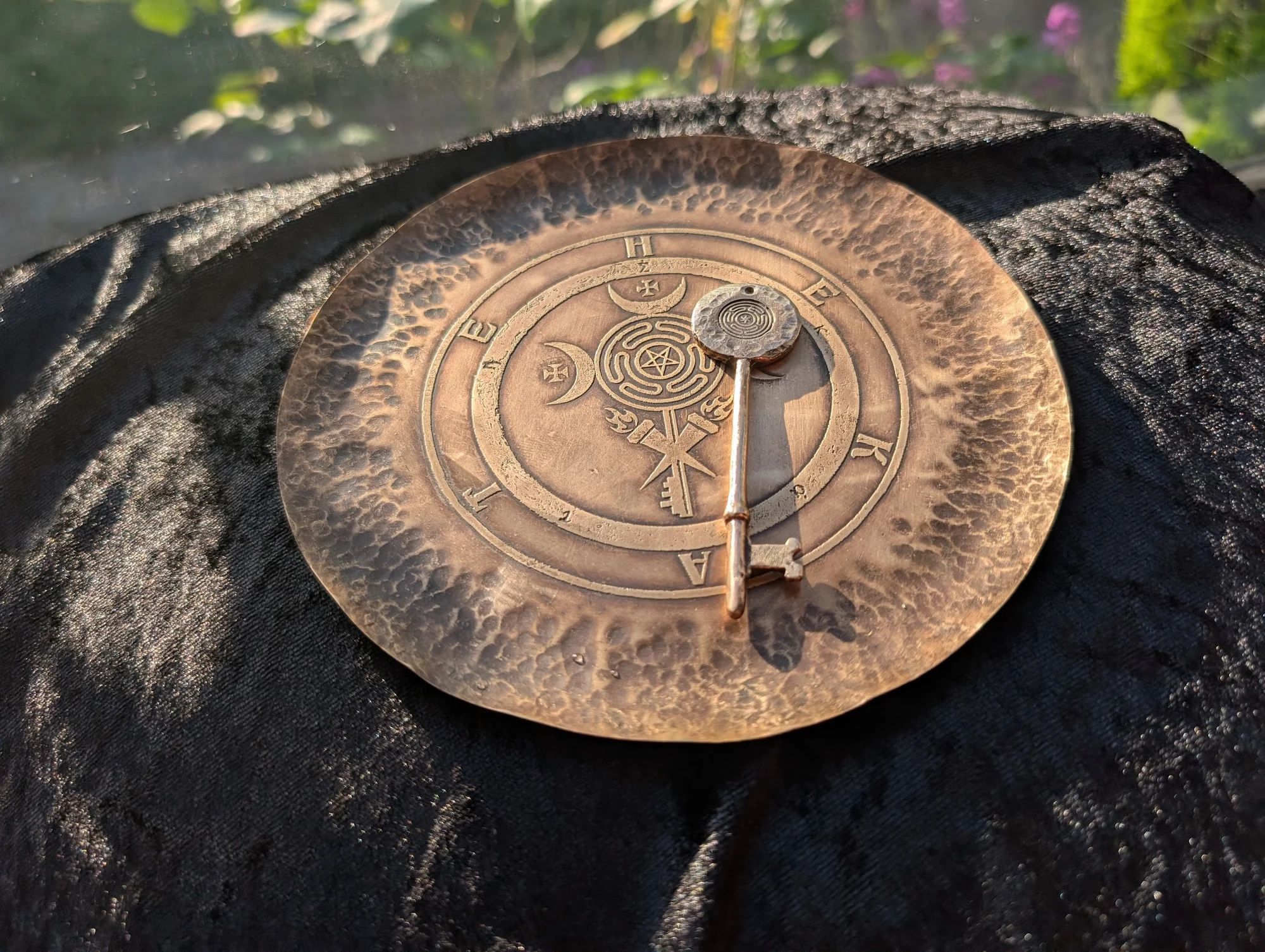 Hammered bronze Hekate offering plate with ritual symbols and strophalos key by BorboroForge