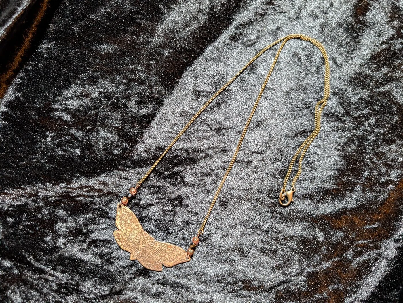 Etched bronze moth pendant on chain by BorboroForge